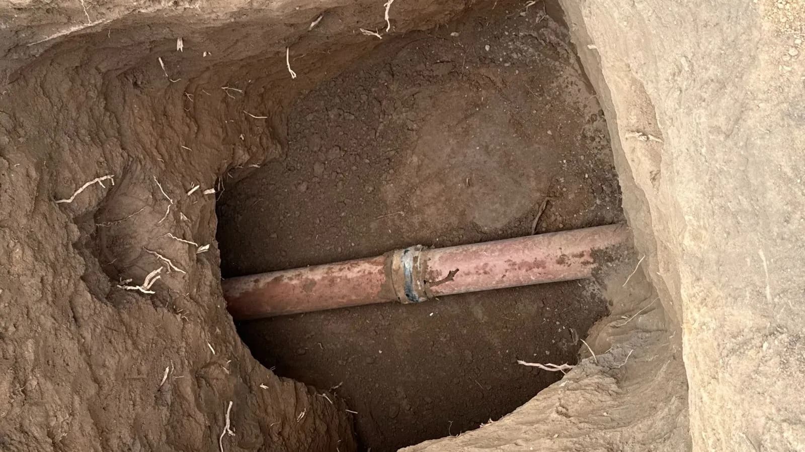 Excavated trench during main sewer line replacement in Altadena