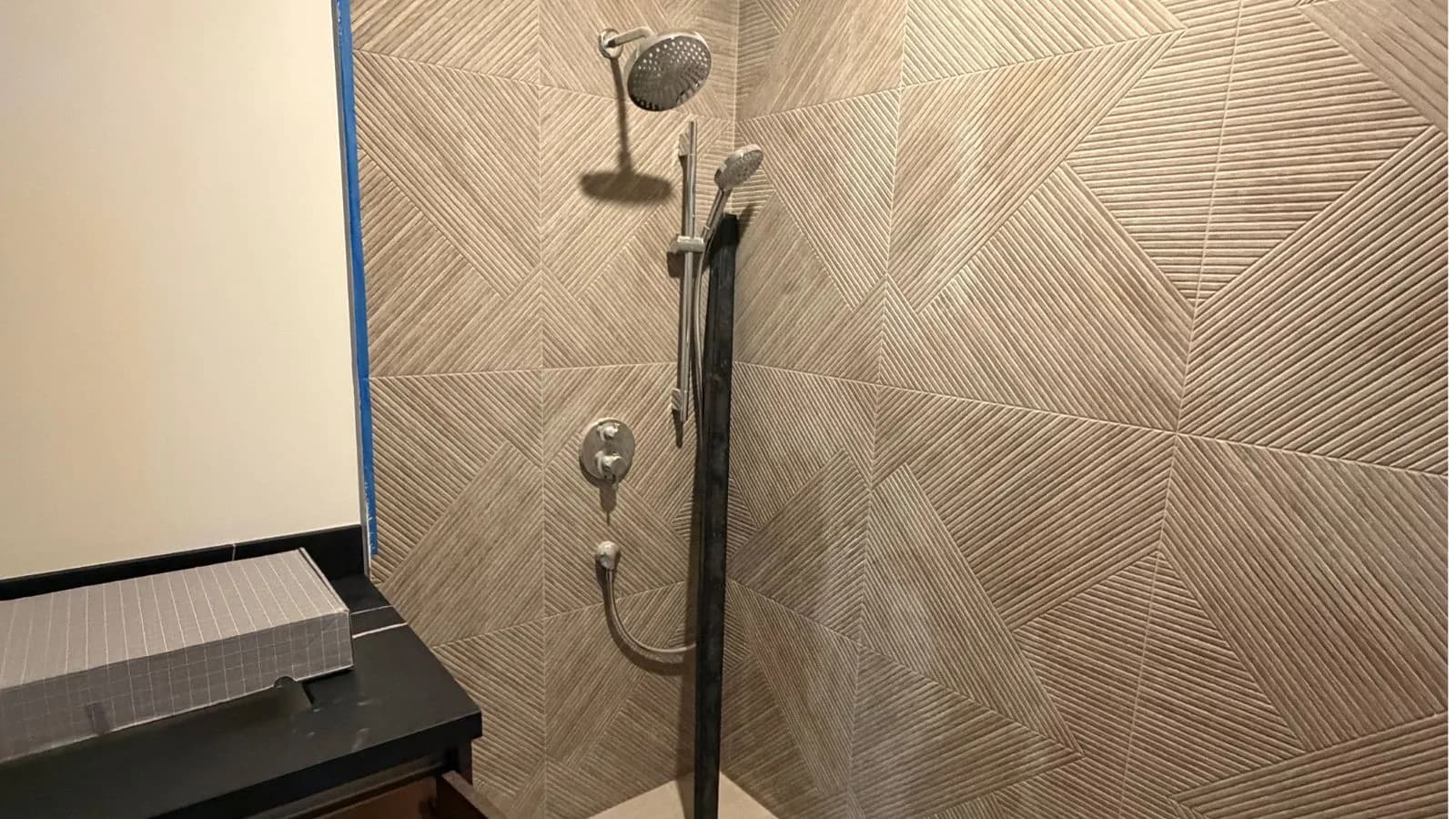 Altadena new construction shower installation with modern tile and plumbing trim