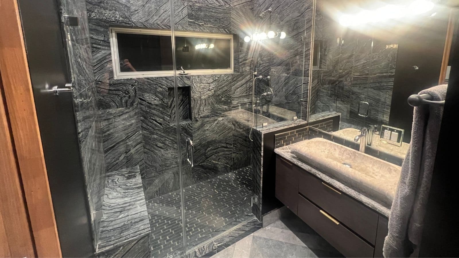 Glendale bathroom remodel completed – modern shower and vanity with finished plumbing connections