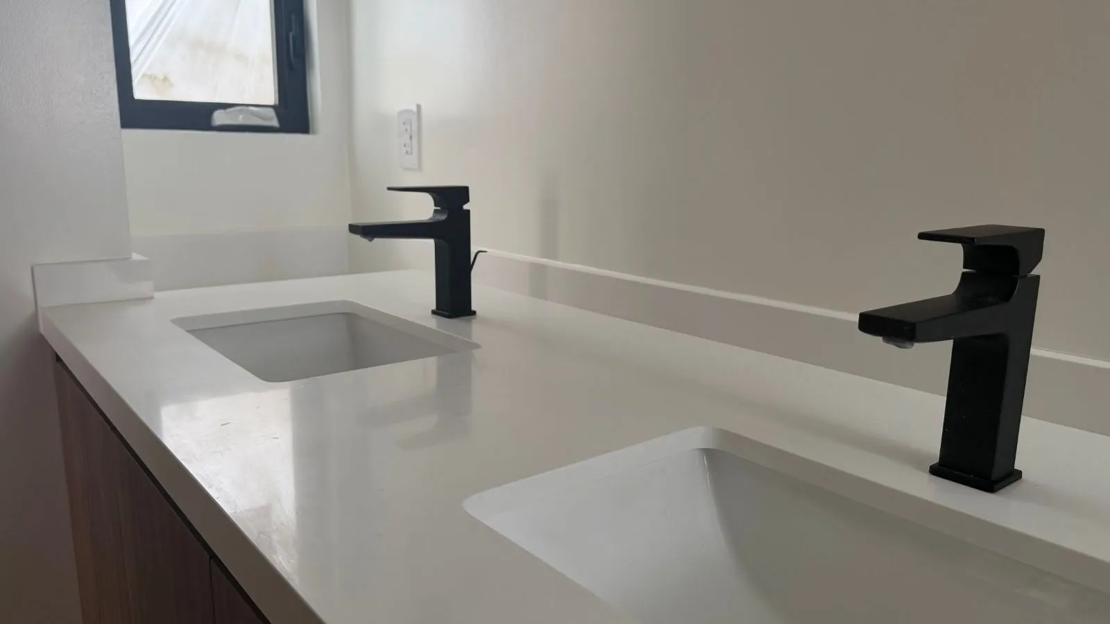 Hansgrohe double sink faucet installation in Glendale bathroom