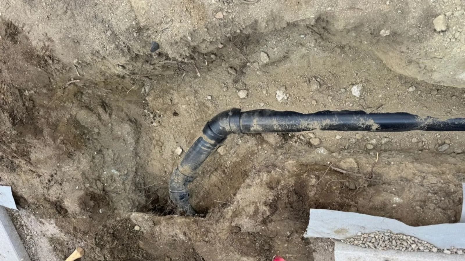 Glendale sewer line after repair – new sewer piping installed in trench with proper alignment