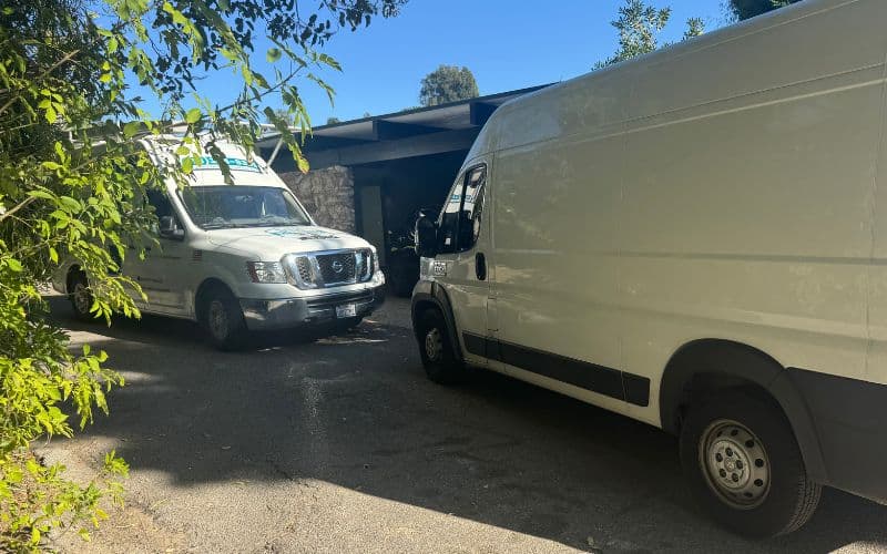 Service vehicles staged for a hydro jetting job in the Hollywood Hills