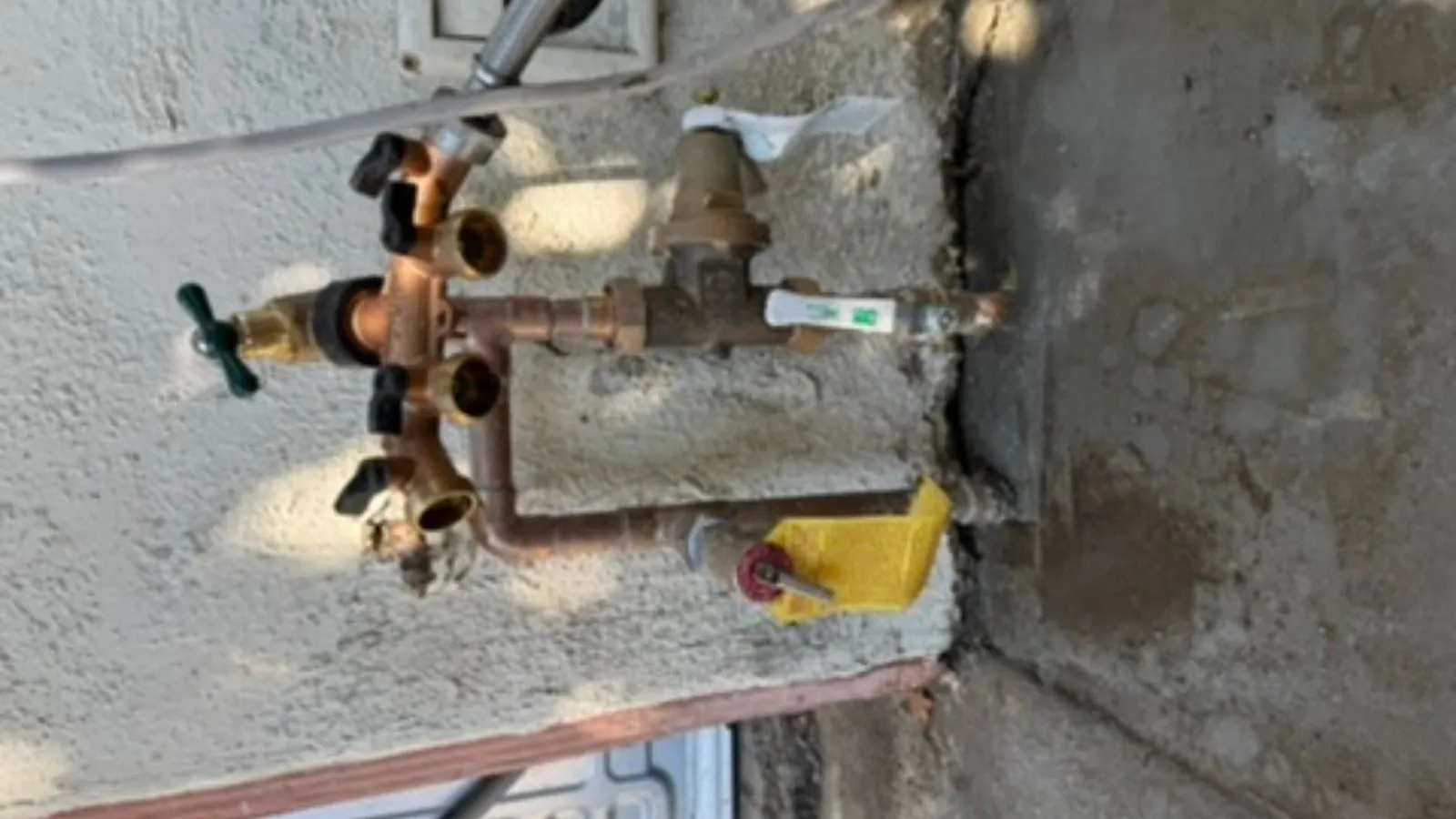 Completed La Crescenta water service line replacement with area prepared for surface restoration