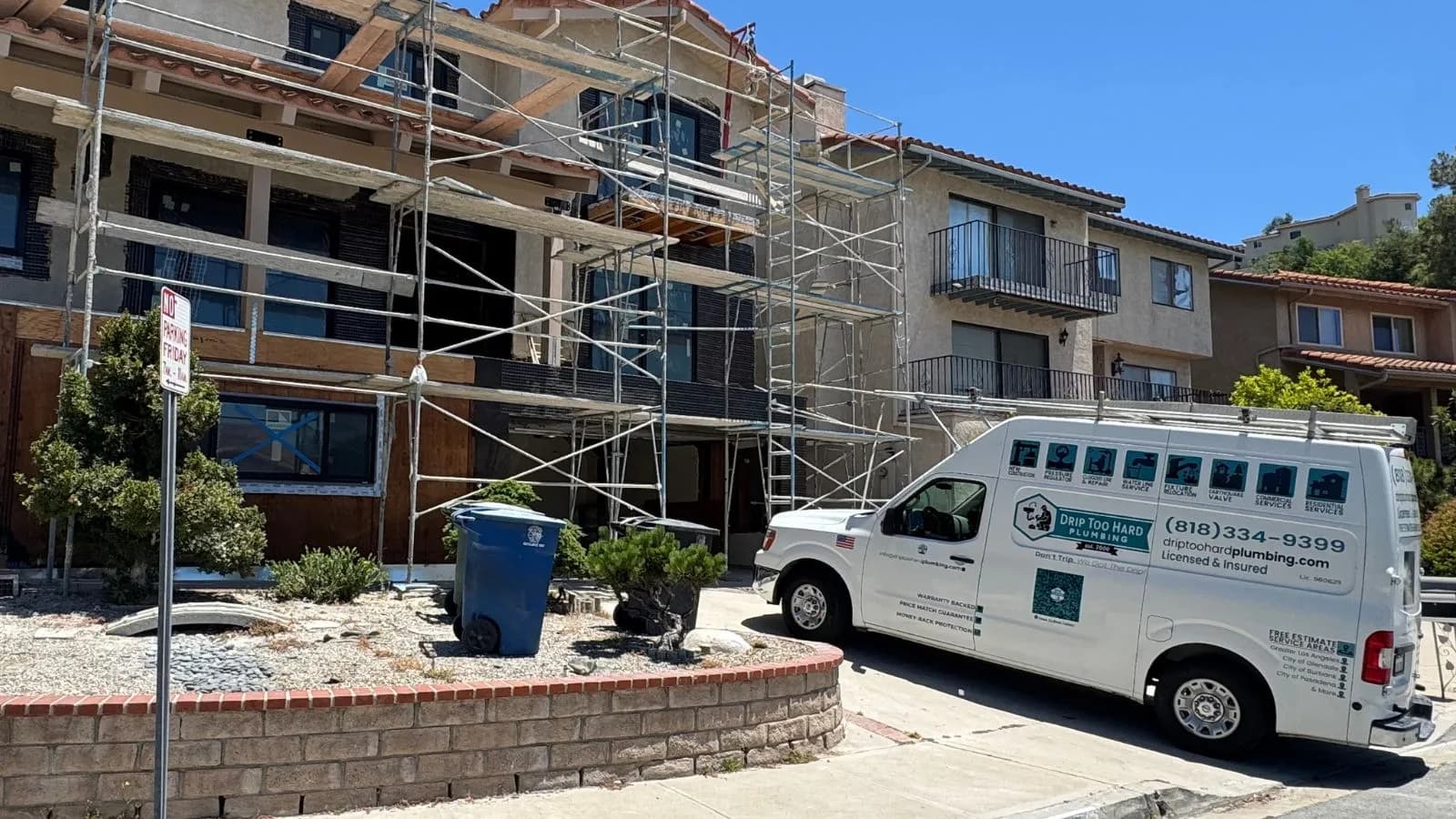 La Crescenta new construction plumbing project – exterior view with service vehicle on site