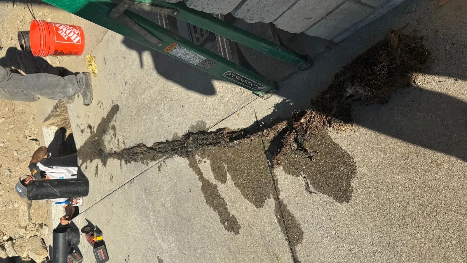 Tujunga sewer excavation showing compromised sewer line prior to replacement