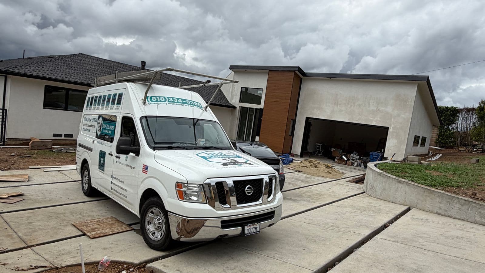 Altadena new construction plumbing with exterior progress and service vehicle on site
