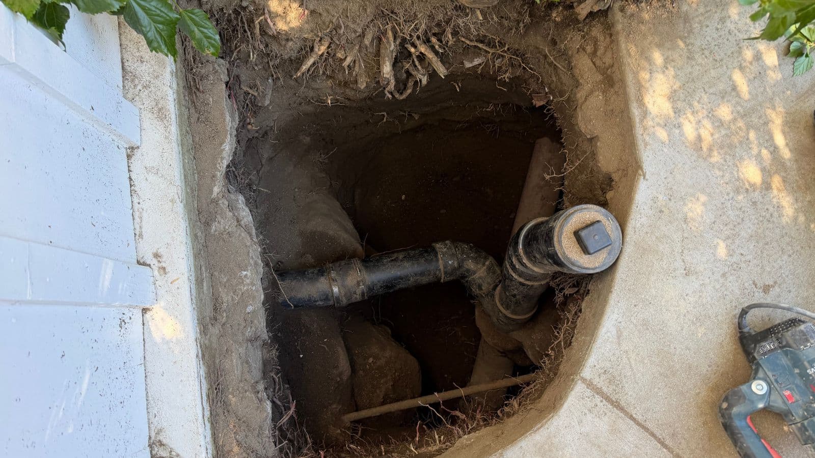 Burbank hillside sewer service before repair – service vehicle staged for limited-access sewer work